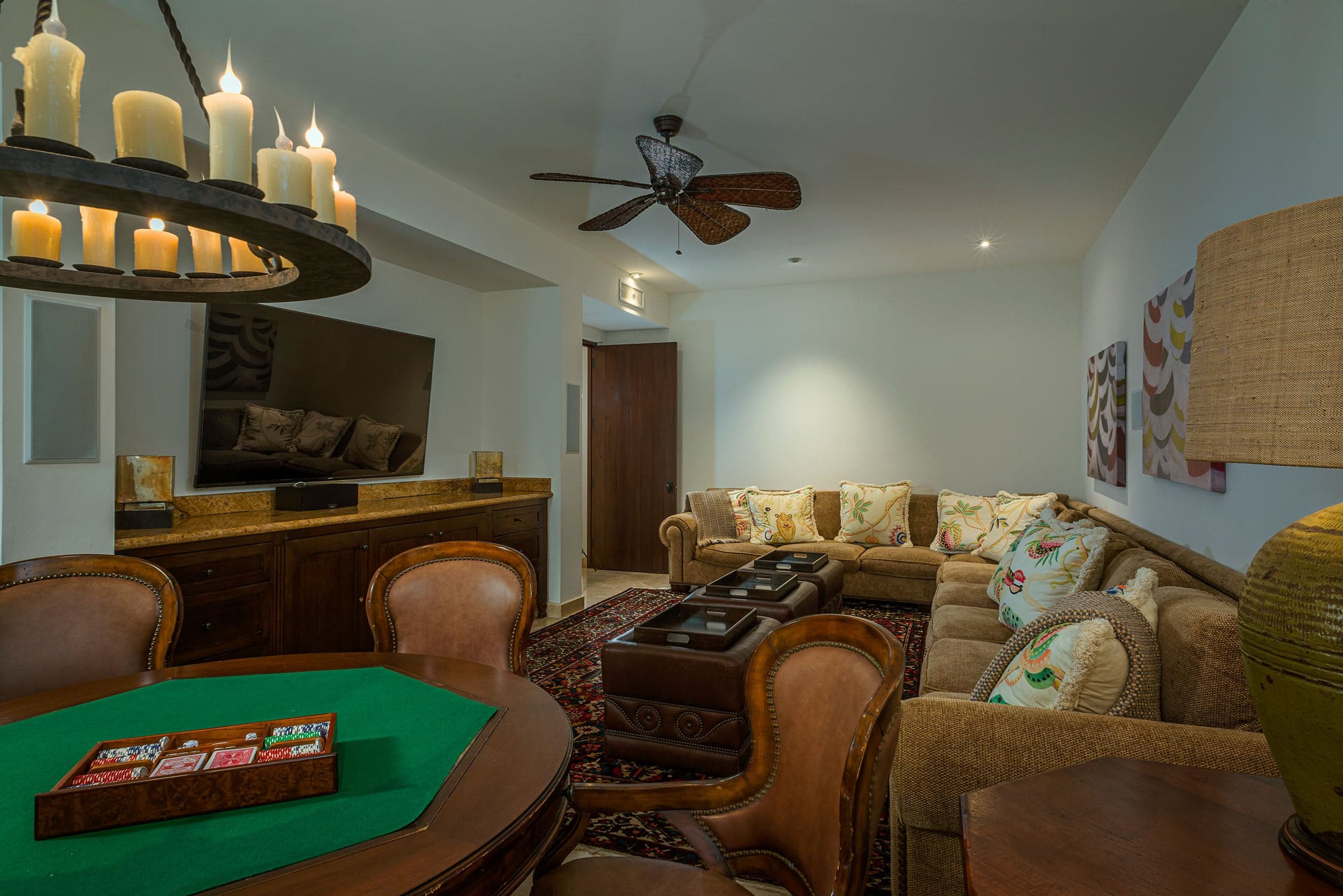 Game room with poker table, Tv, and living room at Casa Cielo Pedregal