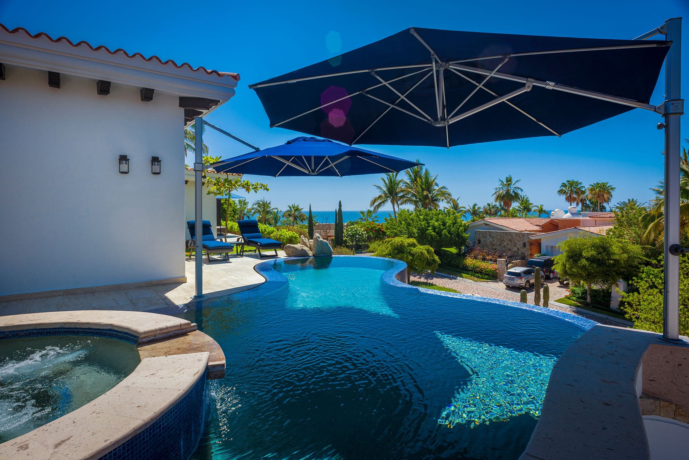 A refreshing swim, soaking in the warm spa, or simply lounging poolside, this exclusive outdoor space offers the ultimate vacation experienc